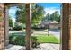 Traditional home exterior with brick columns, manicured lawn, and mature trees at 117 Manous Dr, Canton, GA 30115