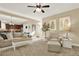 Comfortable living room with open floor plan, neutral colors, and ample seating at 117 Manous Dr, Canton, GA 30115