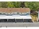 An aerial view of the residential townhomes with private carport parking in a quiet community at 223 Chads Ford Way, Roswell, GA 30076