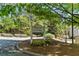 Welcome to Holcomb's Crossing: A private residential community, framed by lush greenery at 223 Chads Ford Way, Roswell, GA 30076