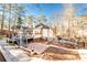The backyard offers a deck, patio, and landscaped area for outdoor enjoyment at 3235 Crestview Dr, Cumming, GA 30041