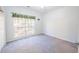 Neutral bedroom with a large window offering natural light at 3235 Crestview Dr, Cumming, GA 30041