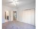 Bedroom with ceiling fan, closet and views of the bathroom and hallway at 3235 Crestview Dr, Cumming, GA 30041