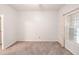 Bedroom with window, closet, and neutral colored carpet at 3235 Crestview Dr, Cumming, GA 30041
