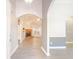 Open foyer featuring archways, gray walls, and wood floors at 3235 Crestview Dr, Cumming, GA 30041