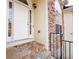 Entrance features a stone stairway, black railing, and a white front door at 3235 Crestview Dr, Cumming, GA 30041