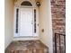 Entrance features a stone stairway and a white front door with sidelights at 3235 Crestview Dr, Cumming, GA 30041