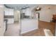 Modern kitchen features white cabinets, stainless steel appliances, and an open floor plan at 3235 Crestview Dr, Cumming, GA 30041