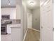 Kitchen with granite countertops, stainless steel appliances, and white cabinets at 3235 Crestview Dr, Cumming, GA 30041