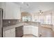 Well-appointed kitchen featuring granite countertops, stainless steel appliances, and a breakfast nook at 3235 Crestview Dr, Cumming, GA 30041