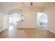 Open floor plan featuring archways, laminate flooring and french doors to the exterior of the home at 3235 Crestview Dr, Cumming, GA 30041