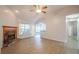 Bright living room features a beautiful fireplace, vaulted ceilings and new laminate flooring at 3235 Crestview Dr, Cumming, GA 30041