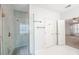 Modern bathroom featuring a glass shower with rainfall showerhead and stylish tile surround at 3235 Crestview Dr, Cumming, GA 30041