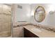 Updated bathroom features modern shower and granite countertops at 4044 Ashentree Dr, Brookhaven, GA 30341