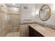 Renovated bathroom boasts a modern shower and granite countertops at 4044 Ashentree Dr, Brookhaven, GA 30341
