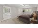 Bright bedroom with a private door, neutral tones, and great natural light at 4044 Ashentree Dr, Brookhaven, GA 30341