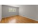 Inviting bedroom featuring hardwood floors and ample natural light at 4044 Ashentree Dr, Brookhaven, GA 30341