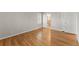 Spacious bedroom with hardwood floors and access to an updated bathroom at 4044 Ashentree Dr, Brookhaven, GA 30341