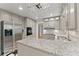 Bright kitchen featuring granite countertops, stainless appliances, and ample cabinet space at 4044 Ashentree Dr, Brookhaven, GA 30341