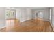 Spacious living room featuring hardwood floors, abundant natural light, and an open layout at 4044 Ashentree Dr, Brookhaven, GA 30341