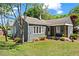 Charming home featuring classic architecture, a cozy porch, and a well-maintained front yard at 756 Ormewood Se Ave, Atlanta, GA 30312
