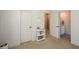 Spacious bedroom with modern white doors leading to a bathroom and closet with good light at 2235 Birchtree Way, Marietta, GA 30062