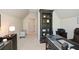 Spacious home office features a bookshelf and contemporary desk for work from home at 2235 Birchtree Way, Marietta, GA 30062