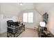 Bright home office features a modern desk and an abundance of natural light at 2235 Birchtree Way, Marietta, GA 30062