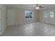 Large bedroom with double doors to the outside, a ceiling fan, neutral colors and flooring at 2340 Bexford Vw, Cumming, GA 30041