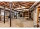 Unfinished basement with exposed insulation, utilities, concrete floor, and shelving at 2927 Ponderosa Cir, Decatur, GA 30033