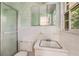 Bathroom featuring classic tile, vanity, and shower at 2927 Ponderosa Cir, Decatur, GA 30033