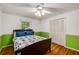 Bedroom with ample closet space, ceiling fan, and bright window at 2927 Ponderosa Cir, Decatur, GA 30033
