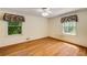 Bedroom featuring hardwood floors and bright windows at 2927 Ponderosa Cir, Decatur, GA 30033