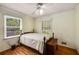 Bedroom featuring hardwood floors, ceiling fan, and natural light at 2927 Ponderosa Cir, Decatur, GA 30033