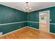 Dining room features hardwood floors, classic millwork, and access to kitchen at 2927 Ponderosa Cir, Decatur, GA 30033