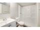 Bathroom with a white shower, toilet, and sink, providing a clean and functional space at 3448 Great Meadows Ct, Lithonia, GA 30038