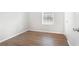 Bright bedroom with hardwood floors and a window letting in natural light at 3448 Great Meadows Ct, Lithonia, GA 30038