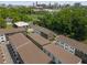 Aerial view of new townhomes, lush greenery, and city skyline offering a blend of urban and suburban living at 913 Spencer Ave, Atlanta, GA 30318