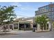 Commercial building with multiple businesses, signage, and valet parking at 913 Spencer Ave, Atlanta, GA 30318