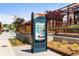 Outdoor information kiosk displays a map of The Works, surrounded by landscaping and pedestrian walkways at 913 Spencer Ave, Atlanta, GA 30318