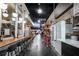 Interior view of the food hall with seating, booths, and menu boards and overall industrial aesthetic at 913 Spencer Ave, Atlanta, GA 30318