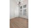 Bright living room featuring large windows, tall ceilings, and modern lighting at 913 Spencer Ave, Atlanta, GA 30318