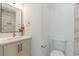 Bathroom showcasing a stylish vanity with white counter top, white cabinets and large mirror at 1300 Memorial Se Dr # 12, Atlanta, GA 30317