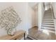 Elegant entryway featuring hardwood floors, modern decor, and staircase at 1300 Memorial Se Dr # 12, Atlanta, GA 30317