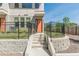 Inviting front entrance featuring concrete stairs, a black metal fence and landscaped yard at 1300 Memorial Se Dr # 12, Atlanta, GA 30317