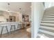 Modern kitchen with stainless steel appliances, pendant lights, and a large island with seating at 1300 Memorial Se Dr # 12, Atlanta, GA 30317