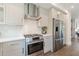 Well-equipped kitchen with modern appliances and ample storage space at 1300 Memorial Se Dr # 12, Atlanta, GA 30317