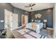 Stylish main bedroom with dark walls, modern decor, and plenty of natural light at 1300 Memorial Se Dr # 12, Atlanta, GA 30317