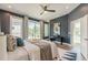 Stylish main bedroom with dark walls, modern decor, and large windows at 1300 Memorial Se Dr # 12, Atlanta, GA 30317