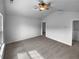 Bright bedroom featuring carpet, a ceiling fan, and white walls at 148 Hill Side Way, Hiram, GA 30141
